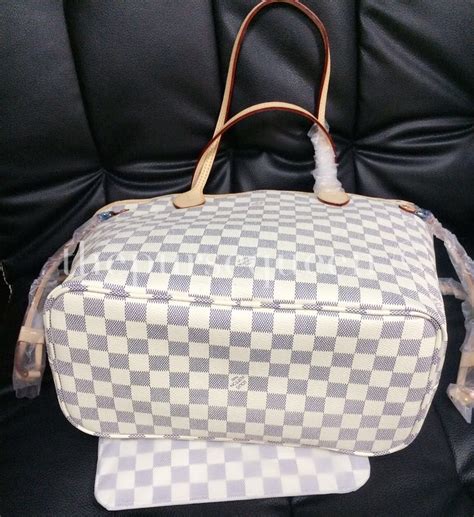 how to spot a fake damier louis vuitton bag|louis vuitton damier ebene bag.